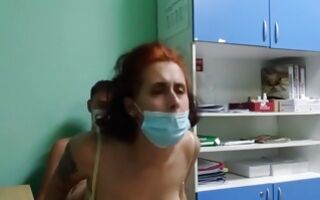 Sassy red-haired bitch blowing dick in the hospital